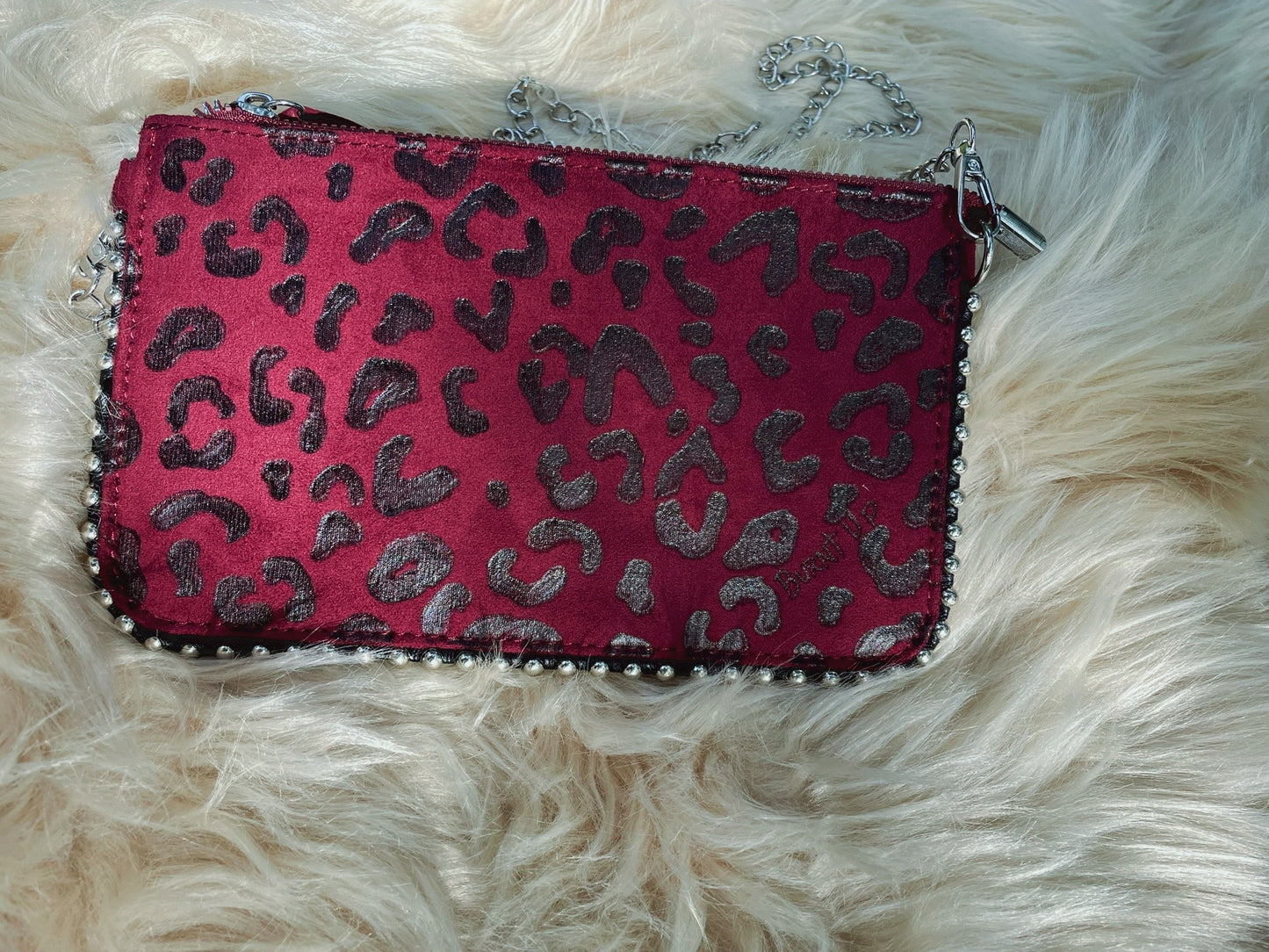 Can’t be tamed clutch purse