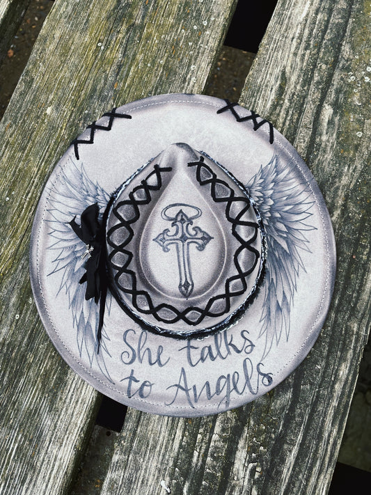 She talks to Angels